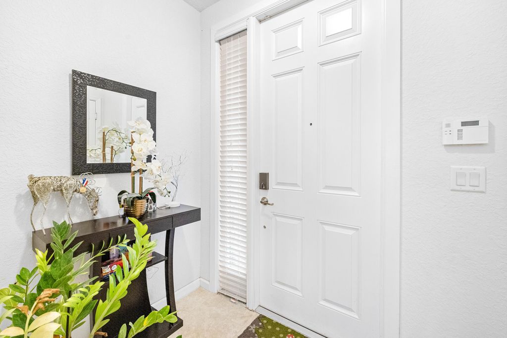 Photo of 5809 Monterra Club Drive, Lake Worth, FL 33463 (MLS # R11159128)