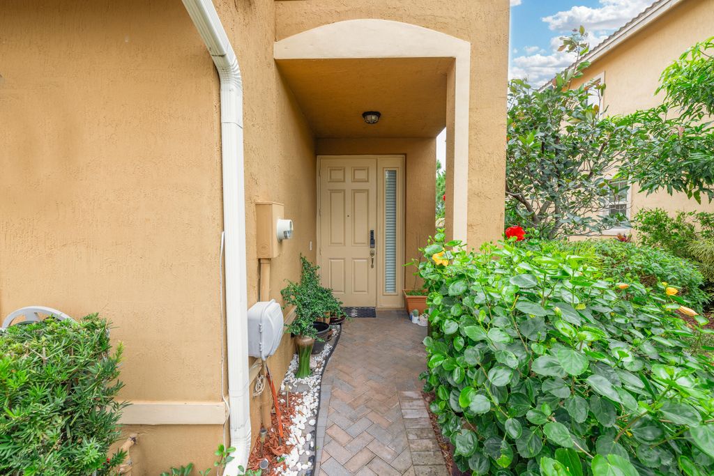 Photo of 5809 Monterra Club Drive, Lake Worth, FL 33463 (MLS # R11159128)