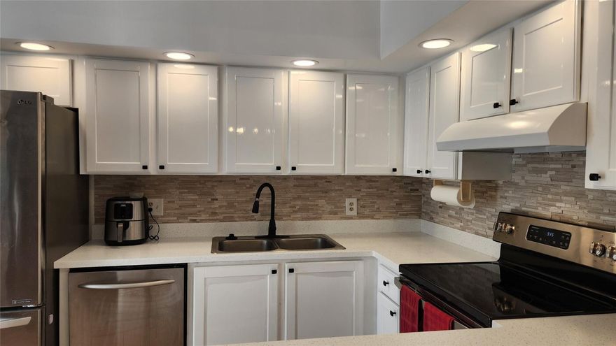 This modern charm townhouse features two spacious bedrooms, each with a private balcony, and a fenced courtyard, providing a peaceful outdoor escape. Featuring modern finishes, a spacious open floor plan. Boasting 2024 renovated kitchen , bedrooms and 2.5 baths, this home offers both comfort and style. Bath in plenty of natural light and a relaxing outdoor patio. With easy access to shopping, dining, the beach, this townhome is the perfect coastal retreat. Residents also enjoy access to a community pool and clubhouse, enhancing the relaxed, tropical lifestyle this home represents. Ideal space for entertaining or simply relaxing and enjoying your own piece of paradise. Community clubhouse and pool to enjoy wth great centralized location beaches, parks, shopping and restaurants minutes away.