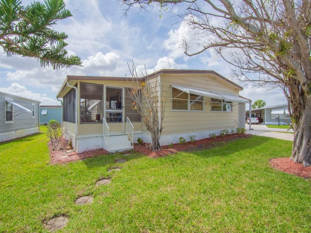 Photo of 225 NE Forrest Court, Jensen Beach, FL 34957 (MLS # B26017325)