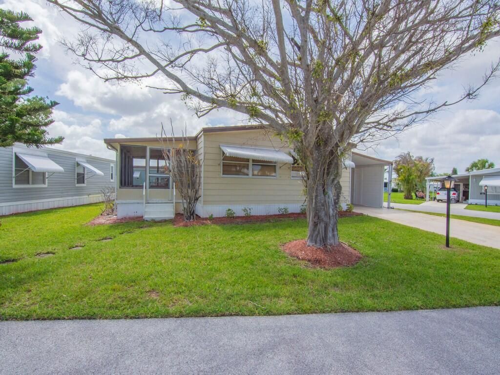 Photo of 225 NE Forrest Court, Jensen Beach, FL 34957 (MLS # B26017325)