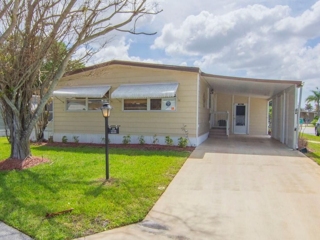 Photo of 225 NE Forrest Court, Jensen Beach, FL 34957 (MLS # B26017325)