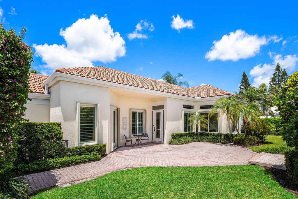 Photo of 116 Coral Cay Drive, Palm Beach Gardens, FL 33418 (MLS # B26030545)