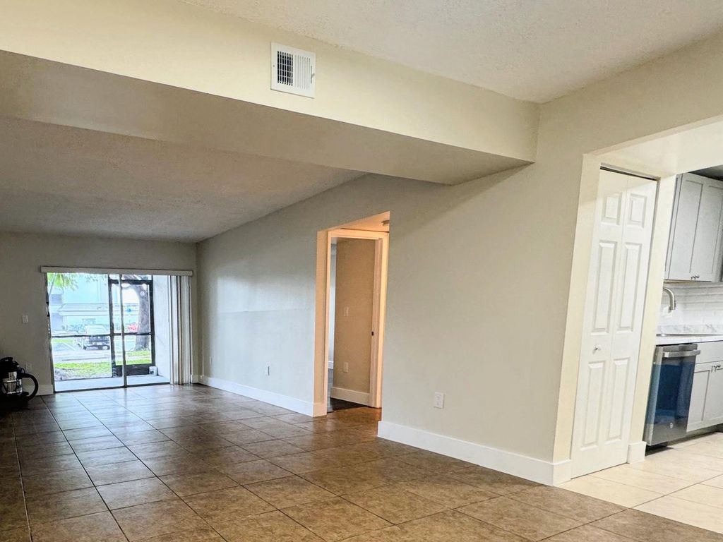 Photo of 711 N Pine Island Road N #103, Plantation, FL 33324 (MLS # B26024631)