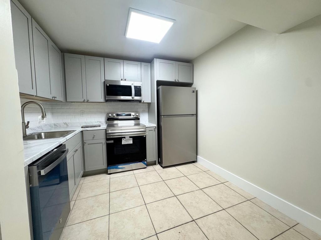Photo of 711 N Pine Island Road N #103, Plantation, FL 33324 (MLS # B26024631)