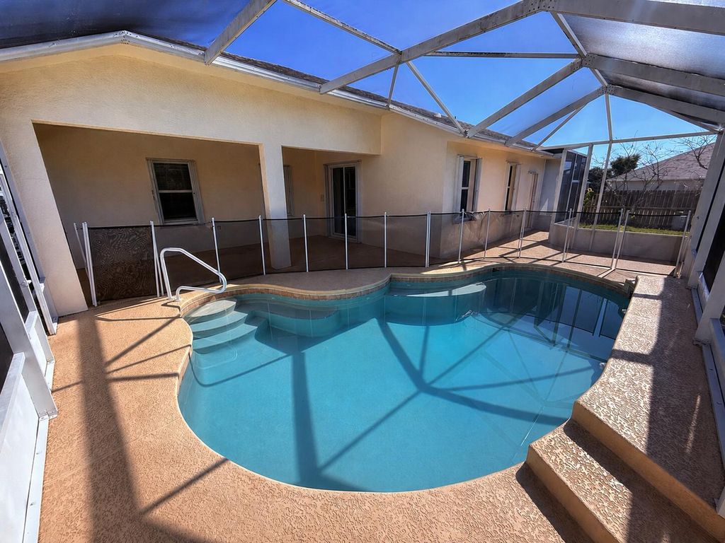 Photo of 1006 SW Majorca Avenue, Port Saint Lucie, FL 34953 (MLS # B26023796)