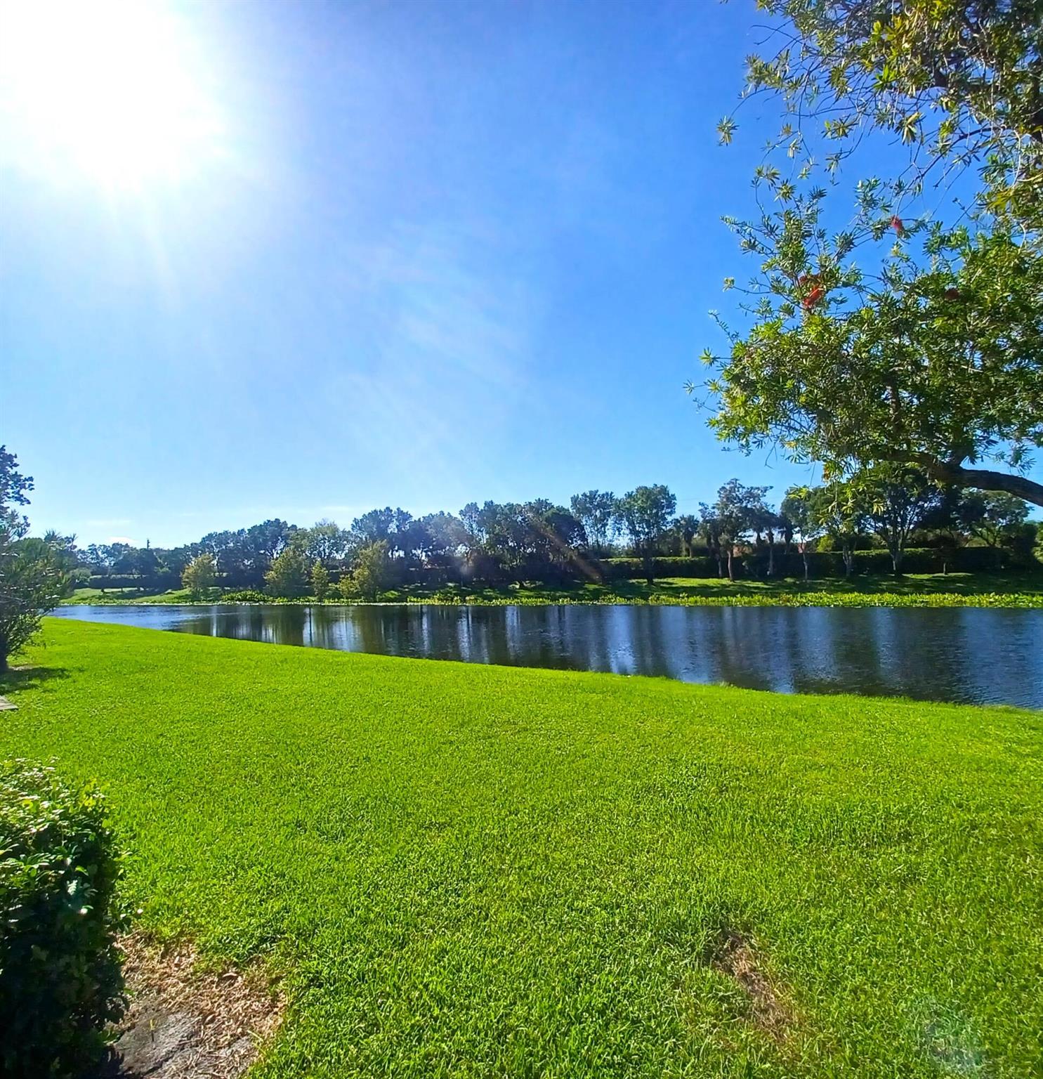 THE BEST OF EVERYTHING!Largest MAJESTY Model 3 BD / 2 BTH + Assigned COVERED PARKING Space. Amazing Lake View w/Southern Exposure. Step into Perfection. Completely Renovated* no expense spared*. White Cabinets, Granite Counters + Backsplash, All New Hardware w/New LG SS Appliances, French Door Refrigerator, Hi Arch Faucet, Custom Undermount Ceramic Sink. All New Vinyl Flooring Thru-Out- Woodland Oak Oyster, Waterproof .22 Mill , New Porcelain Tile in Both Bathrooms. New Shower Enclosures in both Mst + Guest Bthrms, Frameless Shower Enclosures, New Vanities, Lighting, counter tops and Hi Arch Faucets, Dual SinkVanity Mst Bthrm. All Door Knobs, Ceiling Fans and Lighting Fixtures are High End and Brand New. Entire Condo Freshly Painted. AC 2024.