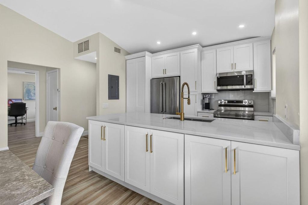 Photo of 516 Club Drive, Palm Beach Gardens, FL 33418 (MLS # R11159106)