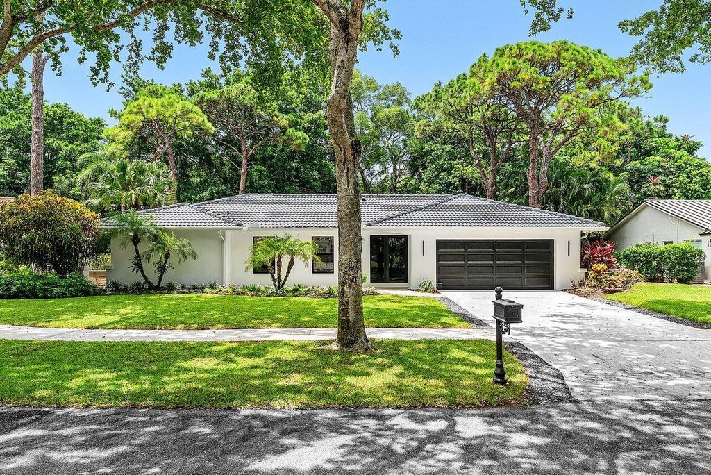 Photo of 2425 NW 36th Street, Boca Raton, FL 33431 (MLS # R11135155)