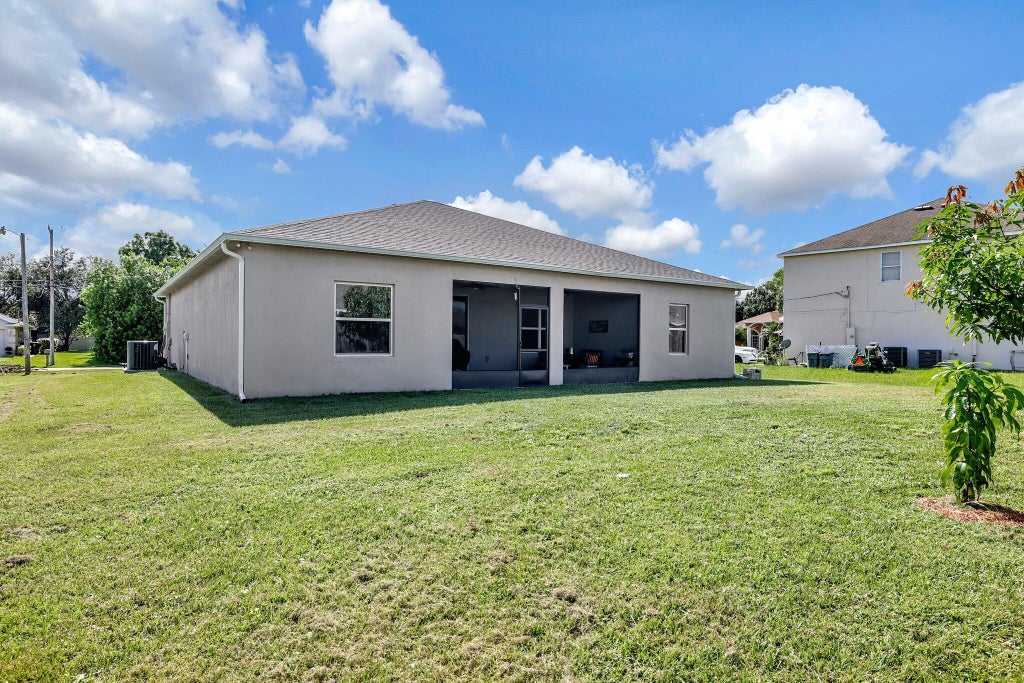 Photo of 5233 NW Jake Court, Port Saint Lucie, FL 34986 (MLS # R11025923)