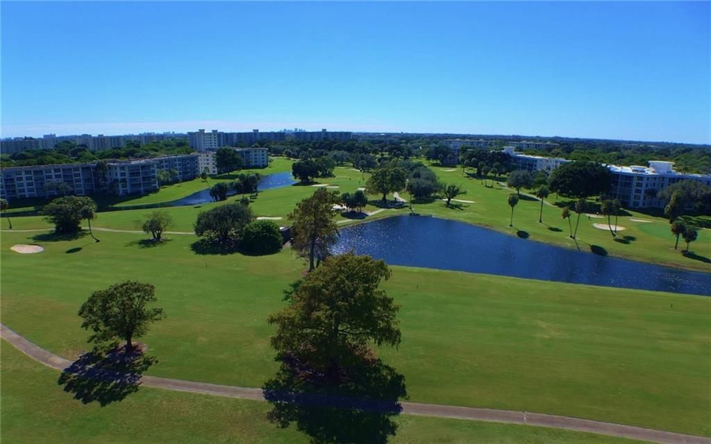 Photo of 3520 Oaks Way #203, Pompano Beach, FL 33069 (MLS # F10305390)