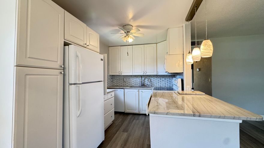 Beautifully maintained 2-bed, 2-bath condo in the highly sought-after Kings Point community of Delray Beach. This light and bright unit features a spacious open living and dining area, updated flooring, and a split-bedroom layout for added privacy. The updated kitchen offers modern finishes, ample cabinetry, and great functionality for everyday living. The primary includes generous closet space. Enjoy beautiful sunset lake views from the screened-in patio, perfect for relaxing or entertaining. Highlights include in-unit laundry convenience. Kings Point is a gated 55+ community with resort-style amenities all within walking of the unit including golf, pools, clubhouse, fitness center, pickleball, theater, and shuttle service. Just minutes to downtown Delray and the beach!