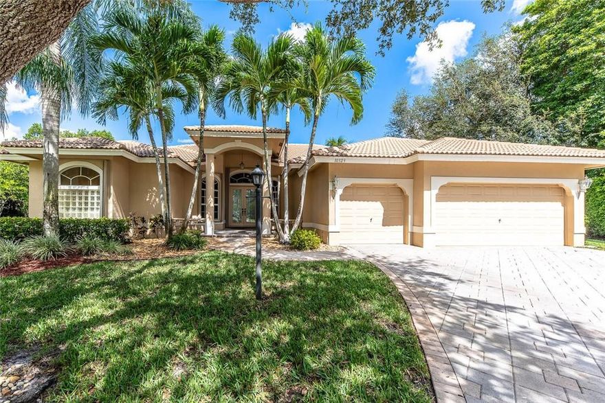 Best Buy in Parkland! Location, location, location! This home sits on an oversized, pie-shaped, cul-de-sac lot - one of the best interior lots in all of Fox Ridge! This 5 bedroom, 3 full bathroom home offers: triple split bedroom plan; freshly painted interior; volume ceilings; stone-look tile on the diagonal in living areas; large, open kitchen with wood cabinets & newer stainless steel appliances; built-in seating in breakfast area; accordion hurricane shutters throughout; paver driveway & patio; huge yard (over 1/3 of an acre); well system for sprinklers to keep water bill low and more! Fox Ridge is guard gated and offers an amenity island with tennis courts, walking paths, playground & volleyball. Low HOA! Walk to all A-rated schools!