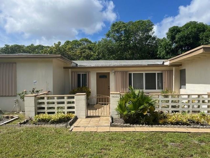 3 bedroom 2 bathroom house on huge fruited property.  Close to 183rd Street and close to shopping and restaurants. A rare find.