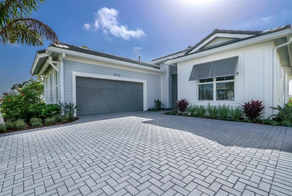 Photo of 9916 Timber Creek Way, Palm Beach Gardens, FL 33412 (MLS # R10749144)