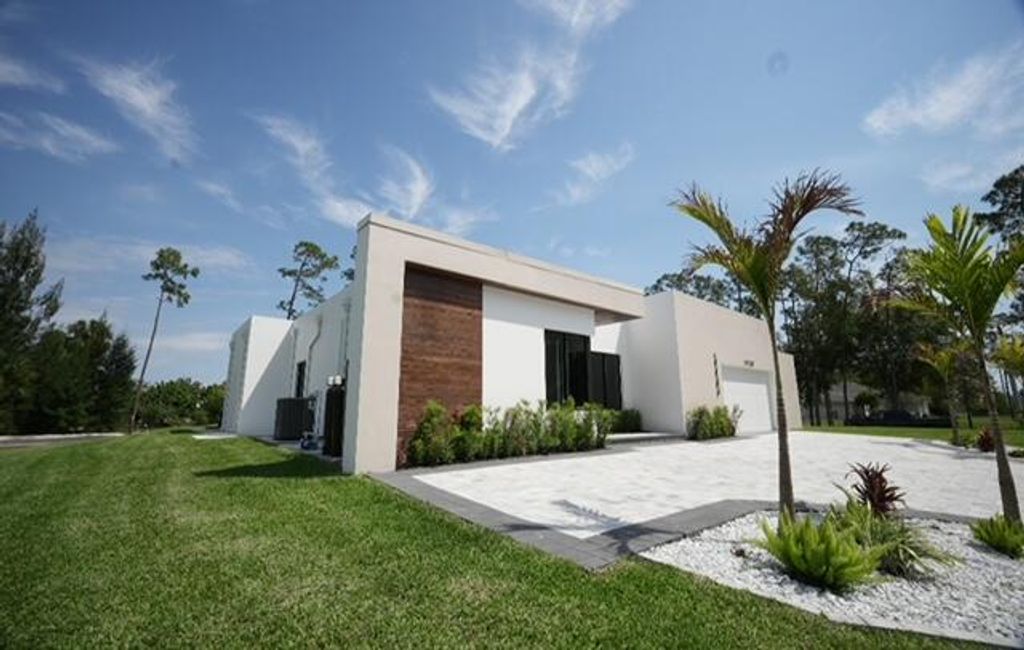 Photo of 17107 W Sycamore Drive W, The Acreage, FL 33470 (MLS # B26006873)