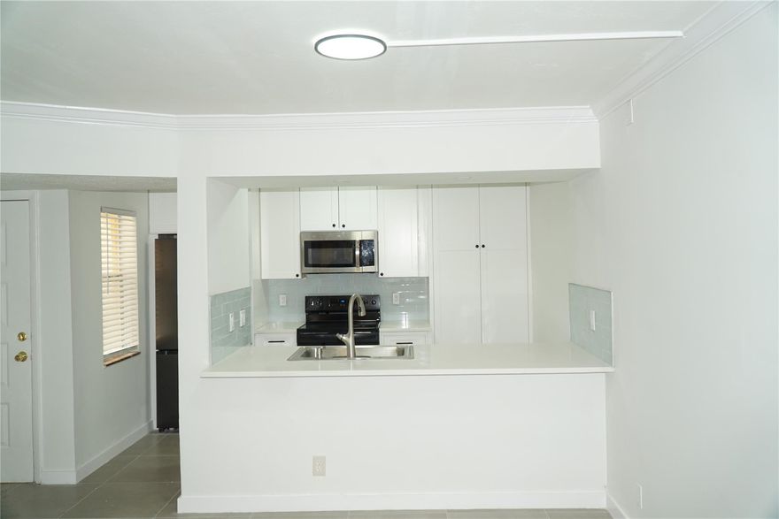Presenting this fully renovated 3 bed 2 bath condo featuring the convenience of an in-unit washer and dryer. Enjoy peace of mind with all-new finishes throughout, including a brand-new A/C system. Start your day with a morning coffee or unwind in the evening while taking in the tranquility of your private outdoor space. This one will not last see broker remarks for additional details.