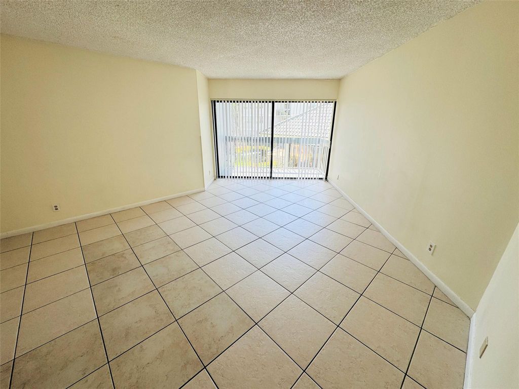 Photo of 1880 N Congress Avenue #210, West Palm Beach, FL 33401 (MLS # F10468108)