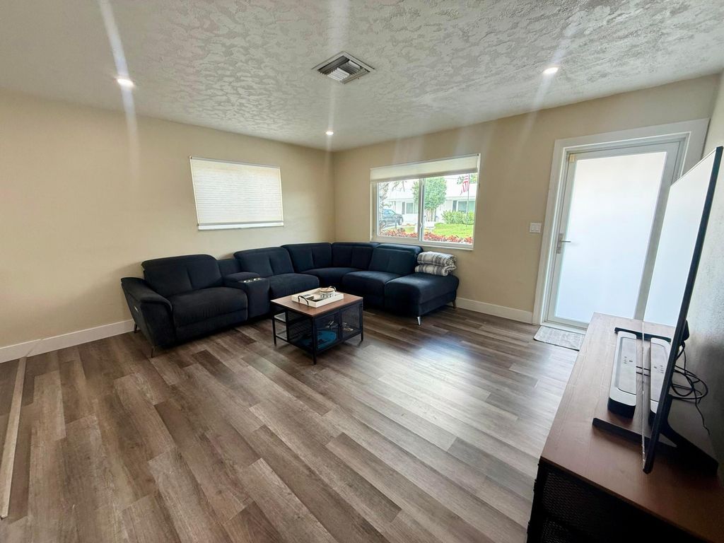 Photo of 2712 NW 52nd Court, Tamarac, FL 33309 (MLS # R11168624)