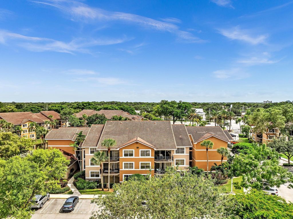 Photo of 8901 Wiles Road #302, Coral Springs, FL 33067 (MLS # R11019273)