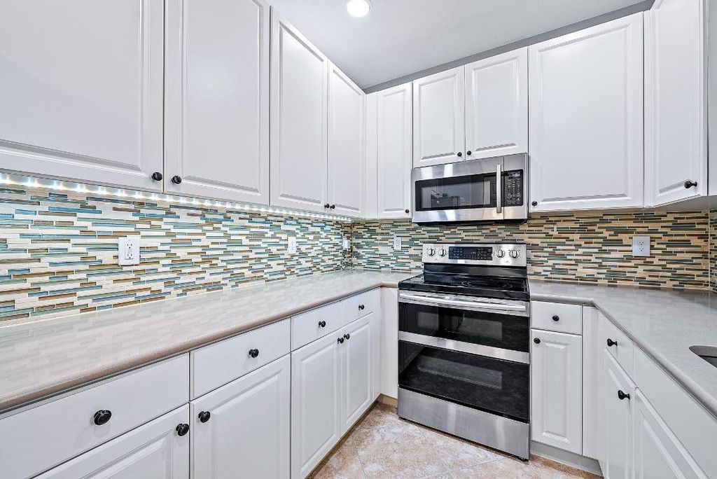 Photo of 4114 Greenway Drive, Jupiter, FL 33458 (MLS # R10930930)