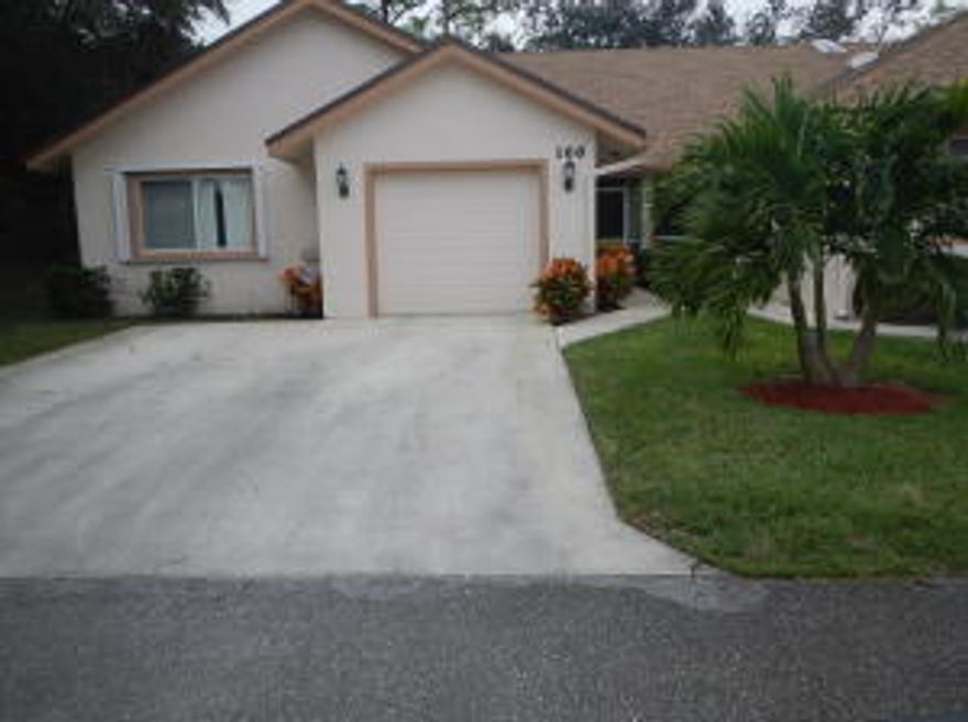 Spacious open floor plan 3 bedroom 2 bath home. End unit for additional privacy. Home has vaulted ceilings, formal dining and living room, screened back patio with Plexiglas inserts to allow air conditioning area by opening up the double sliding glass doors from living room. Master suite includes his & hers walk in closets, wall to wall custom mirrored vanity cabinet and spacious walk in shower. Kitchen has functional counter space and cabinet setup, pantry closet and eat in area with large window for extra natural light. Includes 1 car garage with electric opener and outside driveway will easily accommodate another 2 full size vehicles. Community is pet friendly and has heated pool and clubhouse facility. Great opportunity in highly desirable area. Personal effects in garage do not convey