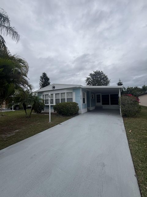 Photo of 114 Camino Del Rio, Port Saint Lucie, FL 34952 (MLS # B26018479)