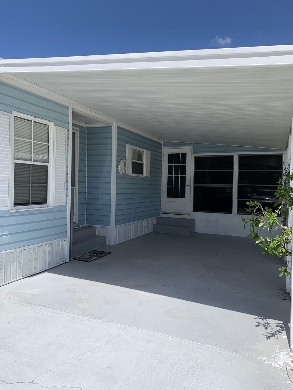 Photo of 114 Camino Del Rio, Port Saint Lucie, FL 34952 (MLS # B26018479)