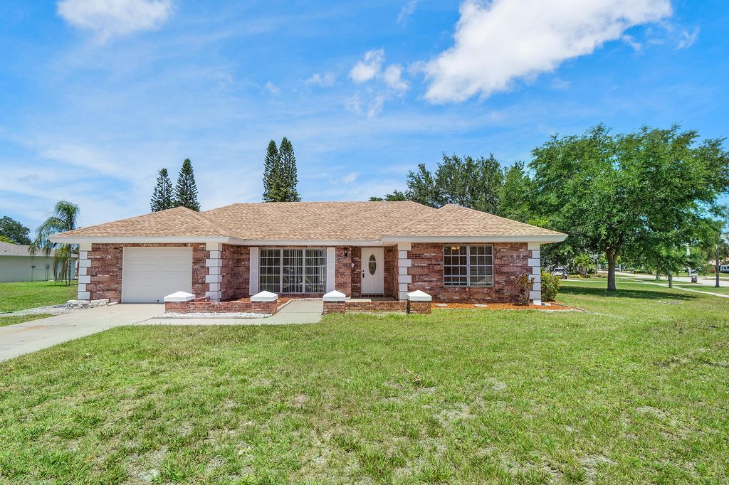 Photo of 1795 SE Adair Road, Port Saint Lucie, FL 34952 (MLS # R10813356)