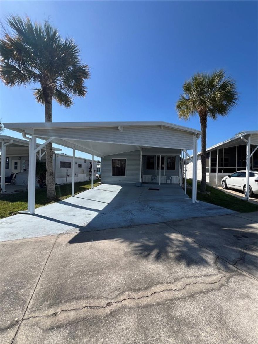 ~Ancient Oaks~ 55+ Community. 2 Bed 1 Bath Park model w/addition. Furnished- on a double street. Huge carport for Truck & Boat or 2 vehicles. Outside shed with washer & dryer, Golf cart included