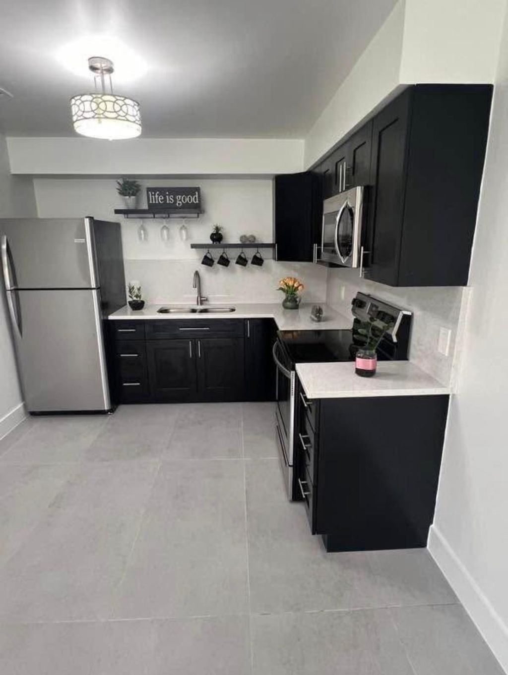 Photo of 4791 Elmhurst Rd #B, West Palm Beach, FL 33417 (MLS # R11159082)