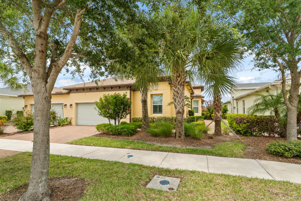 Photo of 12784 SW Lake Fern Circle, Port Saint Lucie, FL 34987 (MLS # B26040431)