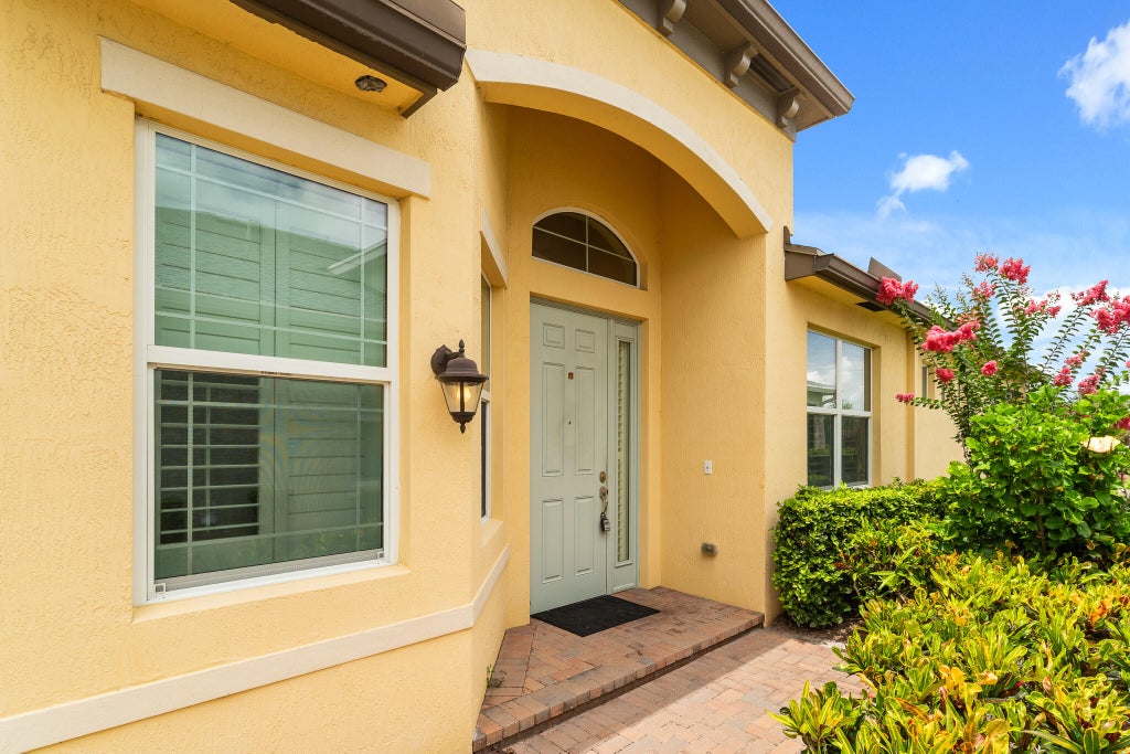 Photo of 12784 SW Lake Fern Circle, Port Saint Lucie, FL 34987 (MLS # B26040431)