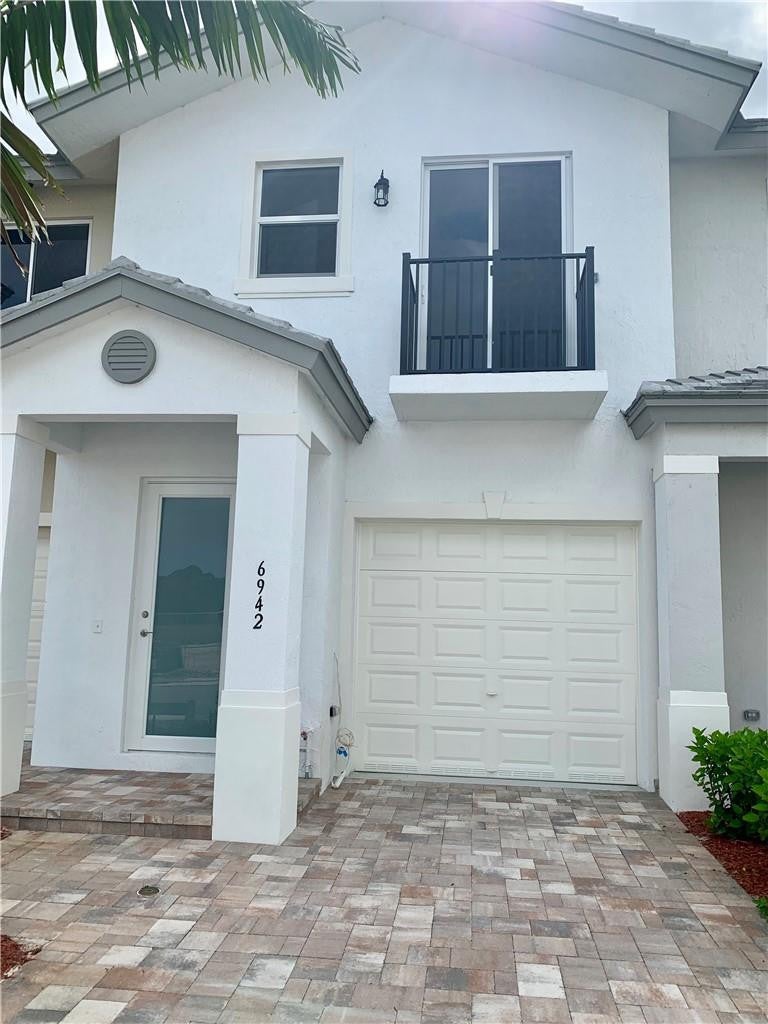 Photo of 6954 PINES Circle #51, Coconut Creek, FL 33073 (MLS # B26071396)