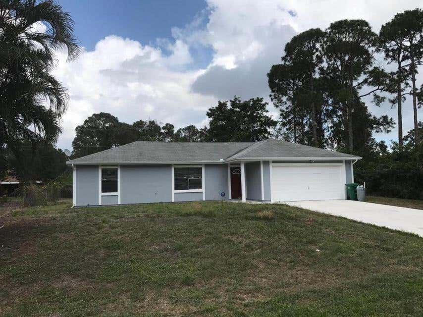 Photo of 3441 SW Esperanto Street, Port Saint Lucie, FL 34953 (MLS # R10804744)