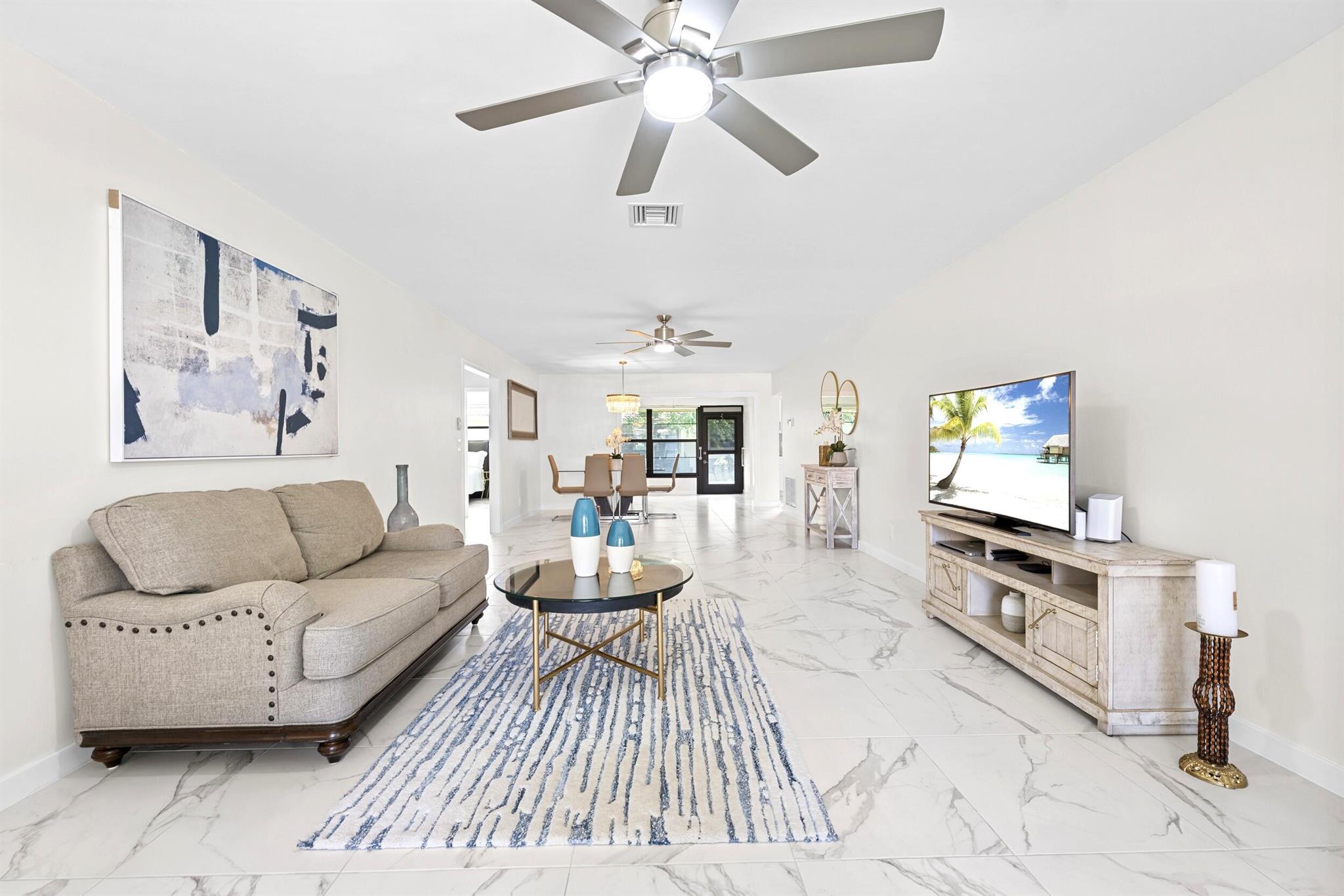 Welcome to your dream home nestled in the vibrant and engaging community of Bent Tree Villas West! This stunning 2-bedroom, 2-bathroom villa offers a perfect blend of modern elegance and comfortable living. Spanning over 1,400 square feet, this residence is designed for both relaxation and entertainment. As you step inside, you'll be captivated by the contemporary remodel that defines this space. The heart of the home is undoubtedly the gourmet kitchen, featuring exquisite granite countertops adorned with beautiful hues of bluish grey. The chic tile backsplash complements the white shaker slow-close cabinetry, providing ample storage for all your culinary needs. Equipped with new stainless steel appliances, including an innovative Instaview refrigerator, this kitchen is a chef's paradise