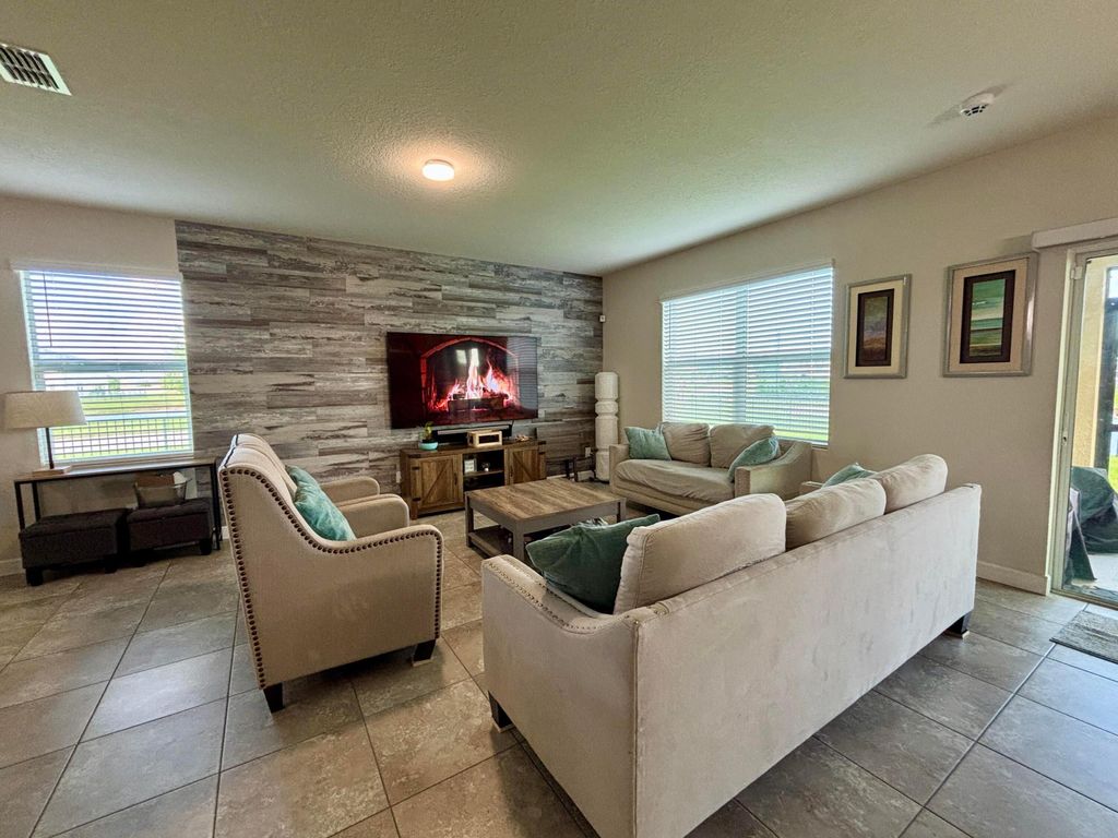 Photo of 10736 SW Prato Way, Port Saint Lucie, FL 34987 (MLS # B26011882)