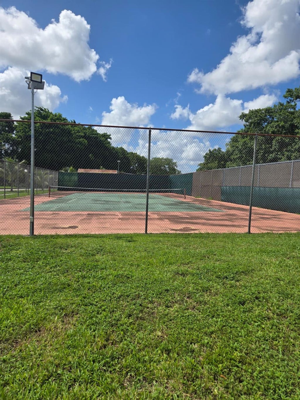 Photo of 8001 FAIRVIEW Drive #104, Tamarac, FL 33321 (MLS # B26080219)