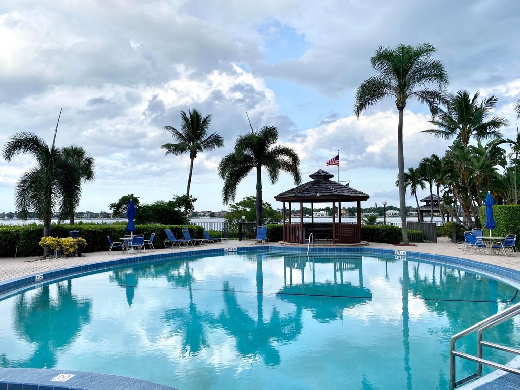 Photo of 7030 Half Moon Circle #216, Hypoluxo, FL 33462 (MLS # B26027432)