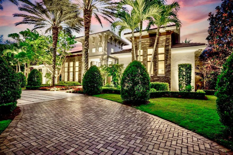 This secluded, single-story custom luxury home is situated on one of the most coveted streets in Old Palm Golf Club, where each homesite spans a full acre. Positioned at the end of a cul-de-sac and backing onto one of Old Palm's private nature preserves, this residence enjoys one of the finest lots in the community. Old Palm Golf Club, an exclusive gated enclave in Palm Beach Gardens, features a newly renovated Raymond Floyd Signature golf course, an upgraded clubhouse, and a state-of-the-art 20,000-square-foot lifestyle center. Club amenities include a new fitness center, spa, resort-style pool, lap pool, fine dining, sports bar, and guest casitas. All these exceptional features are just moments from your doorstep.