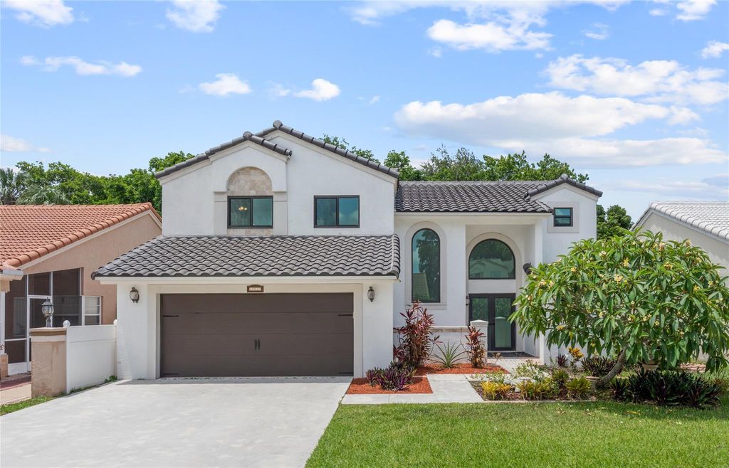 Photo of 10037 Country Brook Road, Boca Raton, FL 33428 (MLS # F10509648)