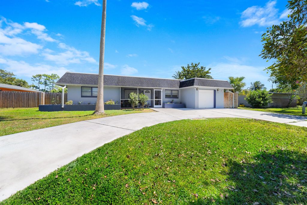 Photo of 210 Sandpiper Avenue, Royal Palm Beach, FL 33411 (MLS # R11071208)