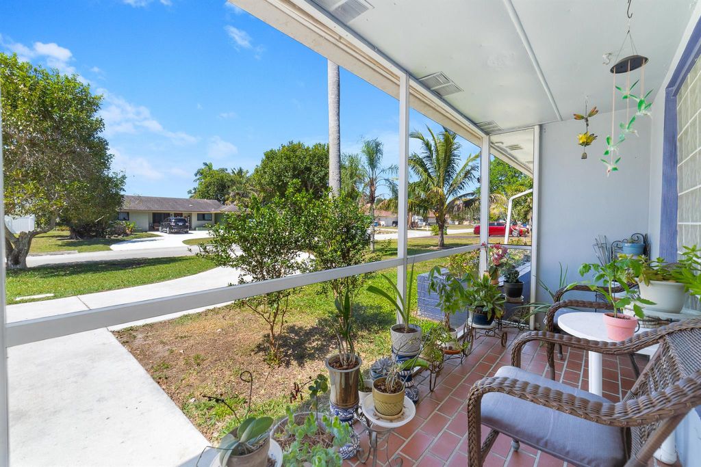 Photo of 210 Sandpiper Avenue, Royal Palm Beach, FL 33411 (MLS # R11071208)