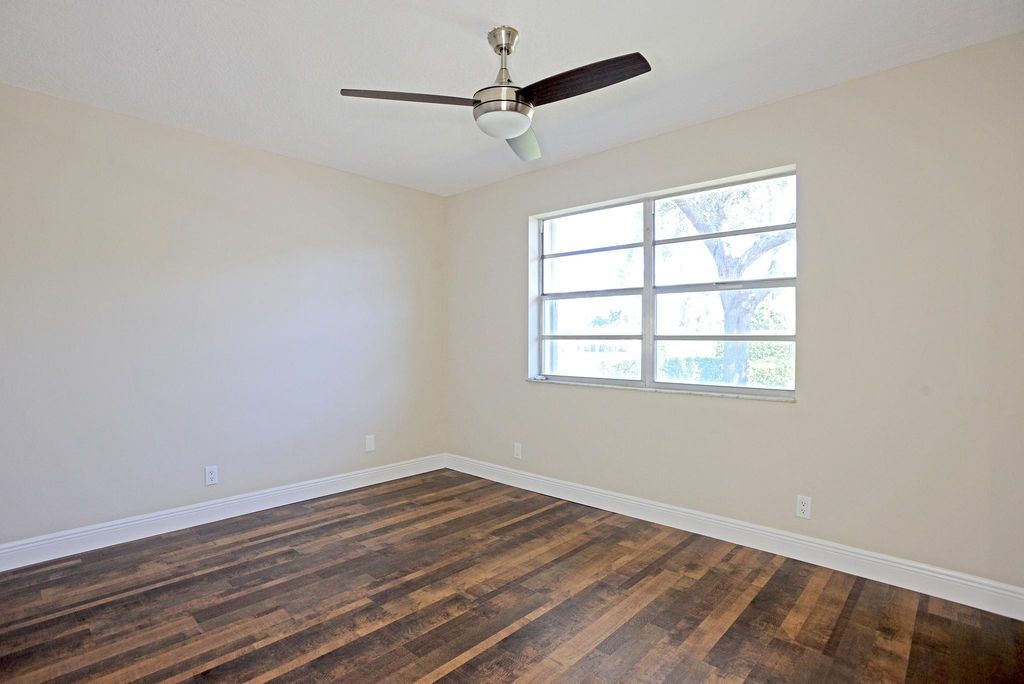 Photo of 1241 NW 18th Avenue Ave #102, Delray Beach, FL 33445 (MLS # R10662620)