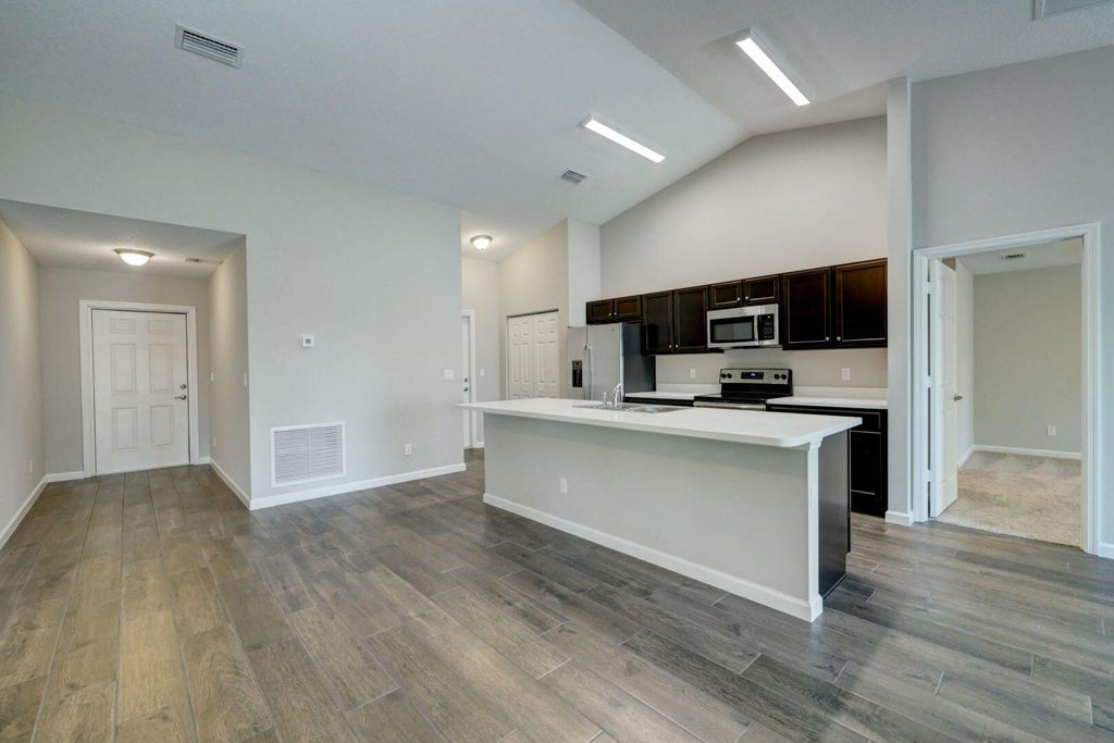 Photo of 1913 SW Swift Avenue, Port Saint Lucie, FL 34953 (MLS # B26068866)