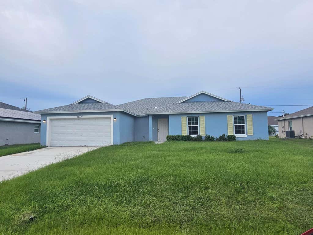 Photo of 1913 SW Swift Avenue, Port Saint Lucie, FL 34953 (MLS # B26068866)