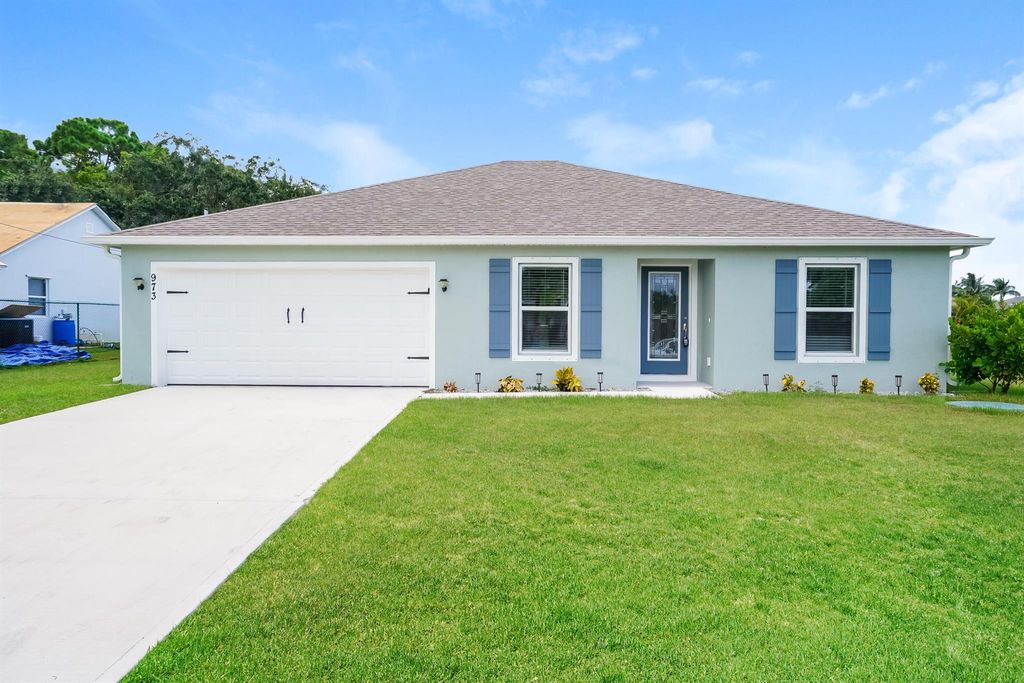 Photo of 973 SE Bayfront Avenue, Port Saint Lucie, FL 34983 (MLS # R11036997)