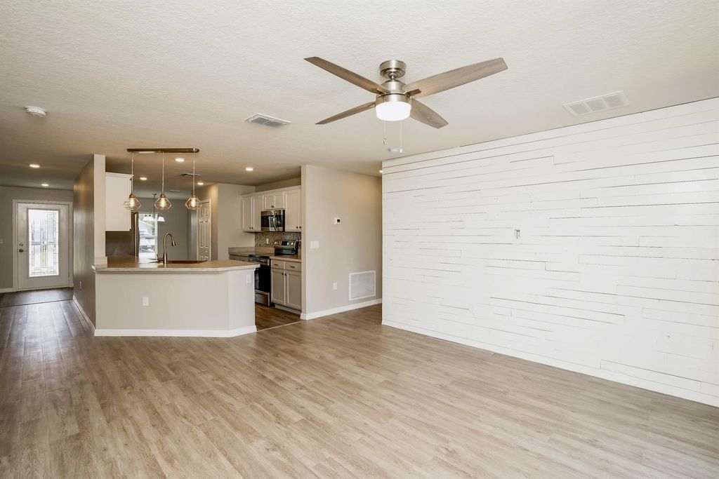 Photo of 973 SE Bayfront Avenue, Port Saint Lucie, FL 34983 (MLS # R11036997)