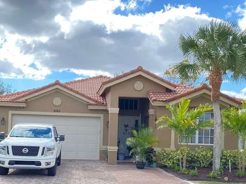 Photo of 2165 Newport Isles Boulevard, Port Saint Lucie, FL 34953 (MLS # B26028198)
