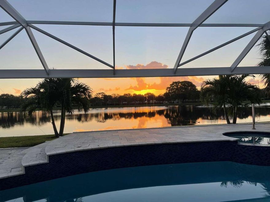 Luxury Lakefront Estate in Palm Beach Gardens – Seasonal and Flexible Terms Available Discover unparalleled elegance and serene lakefront living in this meticulously renovated single-story DIVOSTA home, perfectly positioned on a coveted premium lot within a peaceful, welcoming community. Offering breathtaking water views and sophisticated modern finishes, this property redefines upscale Florida lifestyle. Step inside to soaring ceilings and gleaming hardwood floors throughout. The gourmet kitchen features a double oven and built-in water filtration system—an ideal space for culinary enthusiasts. Relax in the sun-drenched living room and main suite, each showcasing panoramic lake vistas framed by floor-to-ceiling windows.